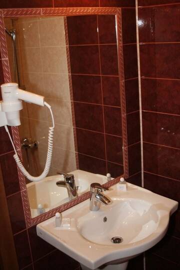 Фото номера Двухместный номер с 2 отдельными кроватями Отель Hotel Elegance г. Асеновград 5